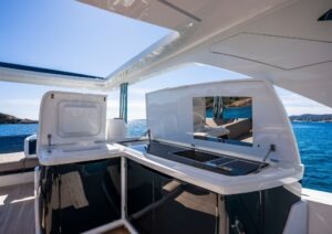 Luxurious 2022 Pearl 62 yacht interior with sleek design and ocean view.
