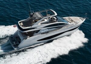 Luxurious 2022 Pearl 62 yacht cruising on open sea, showcasing sleek design and elegance.