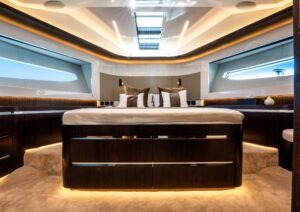Luxurious interior of 2022 Pearl 62 yacht with modern design and ambient lighting.
