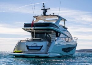 Luxury Pearl 62 yacht from 2022 on open water, showcasing sleek design and elegance.