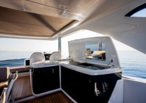 Luxurious 2023 Pearl 62 yacht interior with modern design and ocean view.