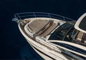 Luxurious 2023 Pearl 62 yacht with spacious sunbathing deck and sleek design.
