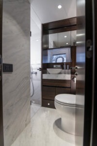 Luxurious bathroom interior of 2021 Sunseeker Manhattan 68 yacht, featuring modern fixtures and elegant design.