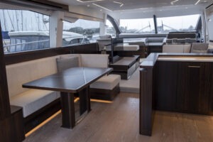Luxurious interior of 2021 Sunseeker Manhattan 68 yacht with elegant seating and modern design.