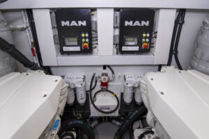 Engine room of 2021 Sunseeker Manhattan 68 yacht with MAN control panels.
