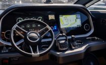 Cockpit of 2023 Pearl 62 yacht with advanced navigation and control systems.