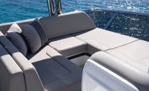 Luxurious seating on 2022 Pearl 62 yacht with ocean view.