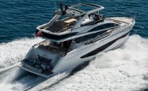 Luxurious 2022 Pearl 62 yacht cruising on open sea, showcasing sleek design and elegance.