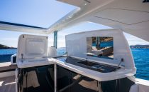 Luxurious 2022 Pearl 62 yacht interior with sleek design and ocean view.