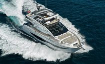 Luxurious 2022 Pearl 62 yacht cruising on open sea, showcasing sleek design and elegance.