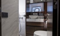 Luxurious bathroom interior of 2021 Sunseeker Manhattan 68 yacht, featuring modern fixtures and elegant design.