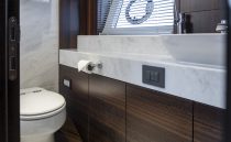 Luxurious bathroom in 2021 Sunseeker Manhattan 68 yacht with modern fixtures and elegant design.