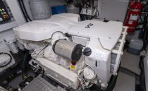 Engine room of 2021 Sunseeker Manhattan 68 yacht featuring a powerful V8 engine.